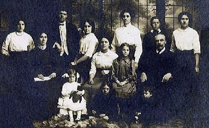 Cooper family c1913.standing: Annie,Herbert Ratcliffe,Rose,Thomas,Alice.seated:Nancy Jane,Bertha,Ellen,Jessie,Thomas Henry.front: Elsie, Robert, Henry